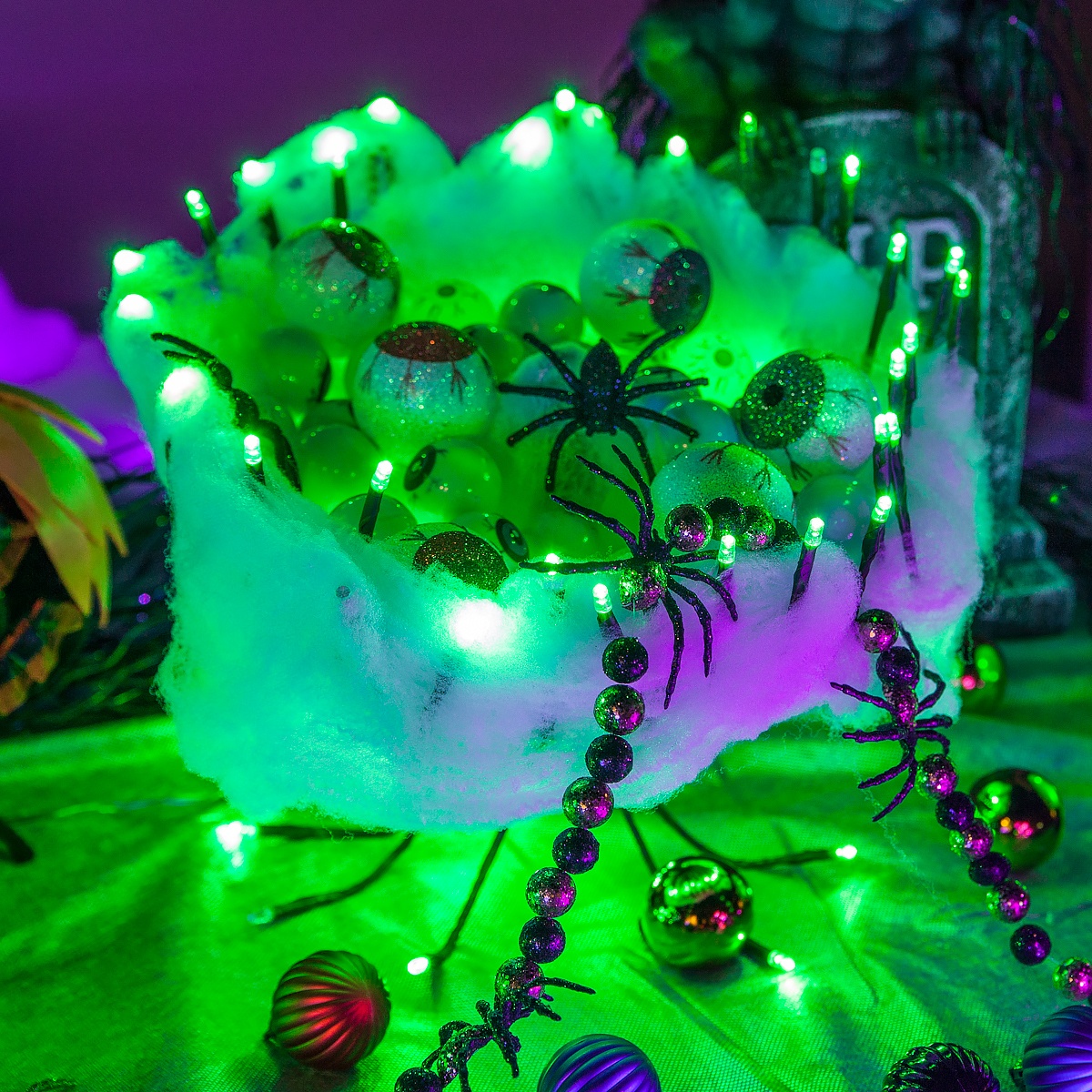 DIY Halloween Decoration - Creepy eyeball bowl made using starbust lighted branches