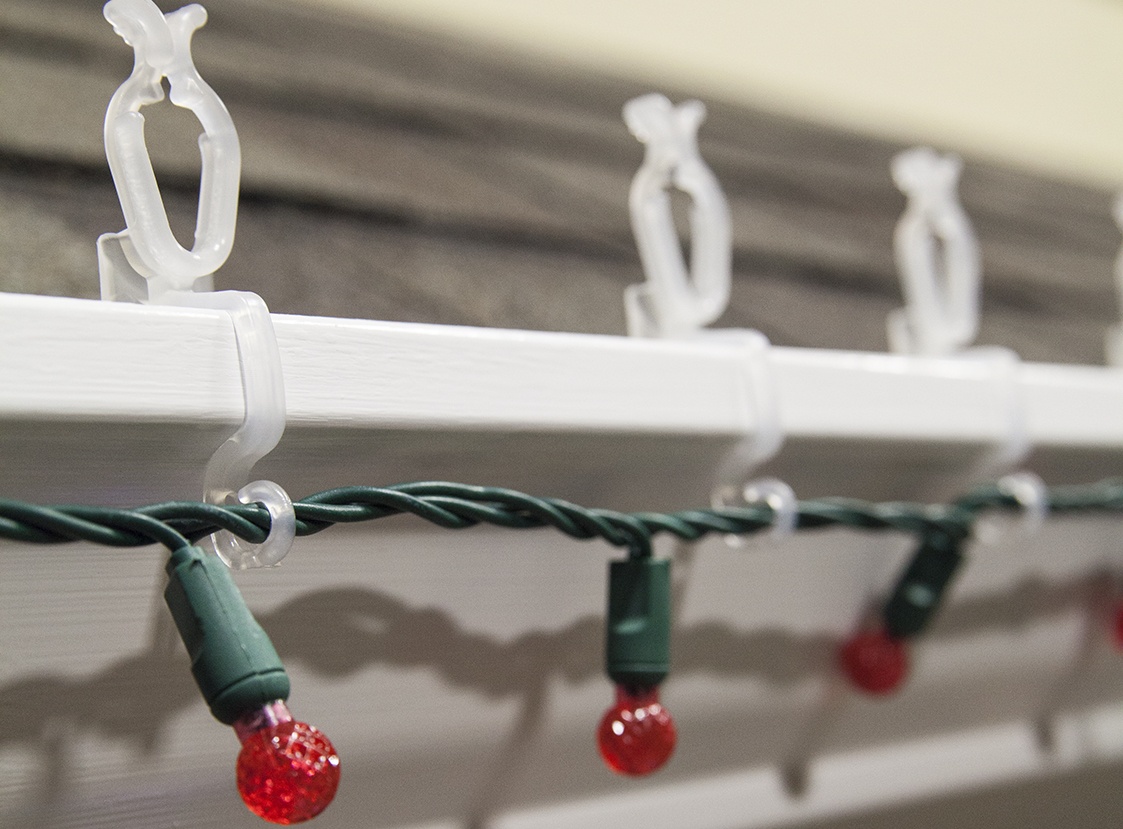 all in one plus light clip hanging G12 light strings on gutters