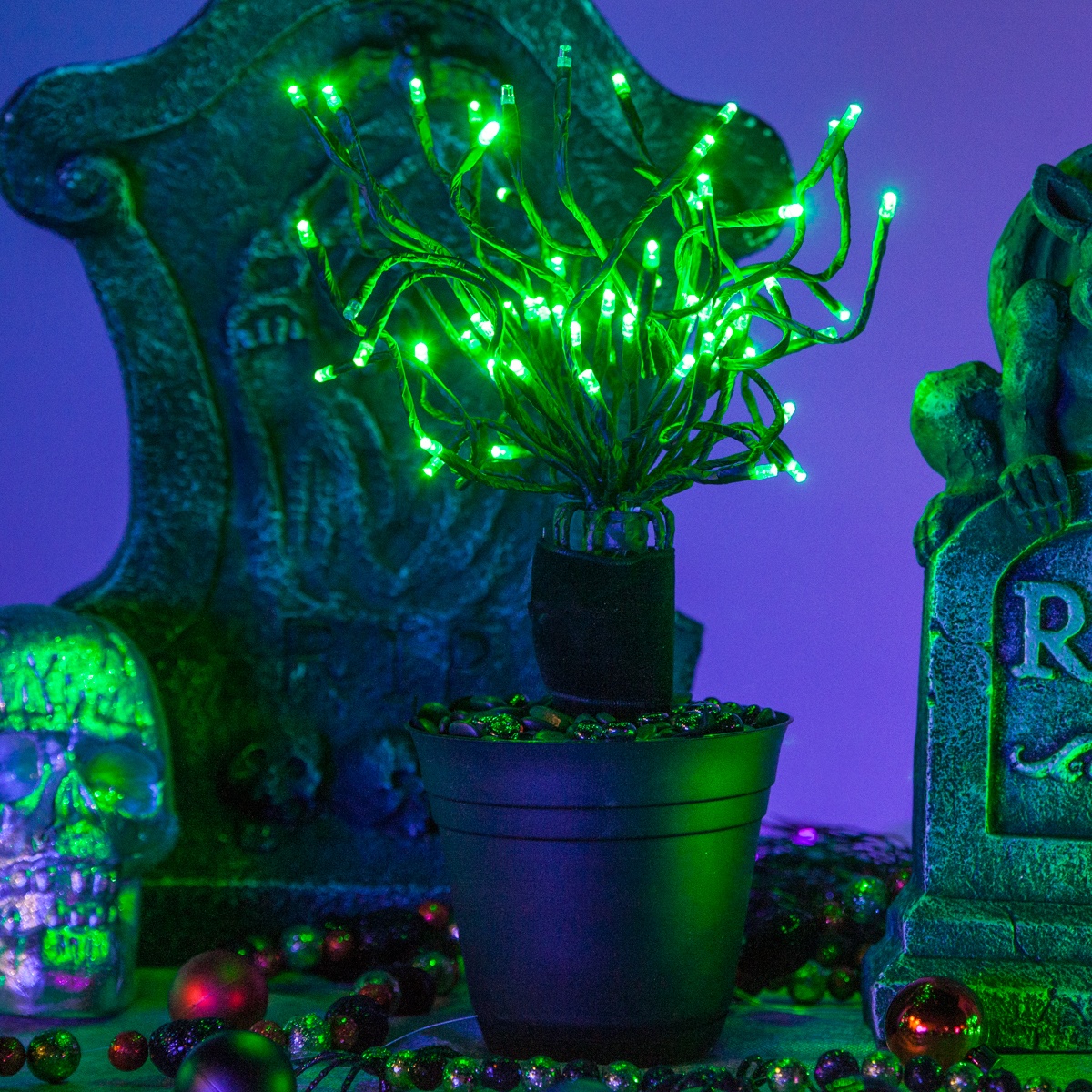 Spooky DIY Halloween tree decoration made using starburst lighted branches!